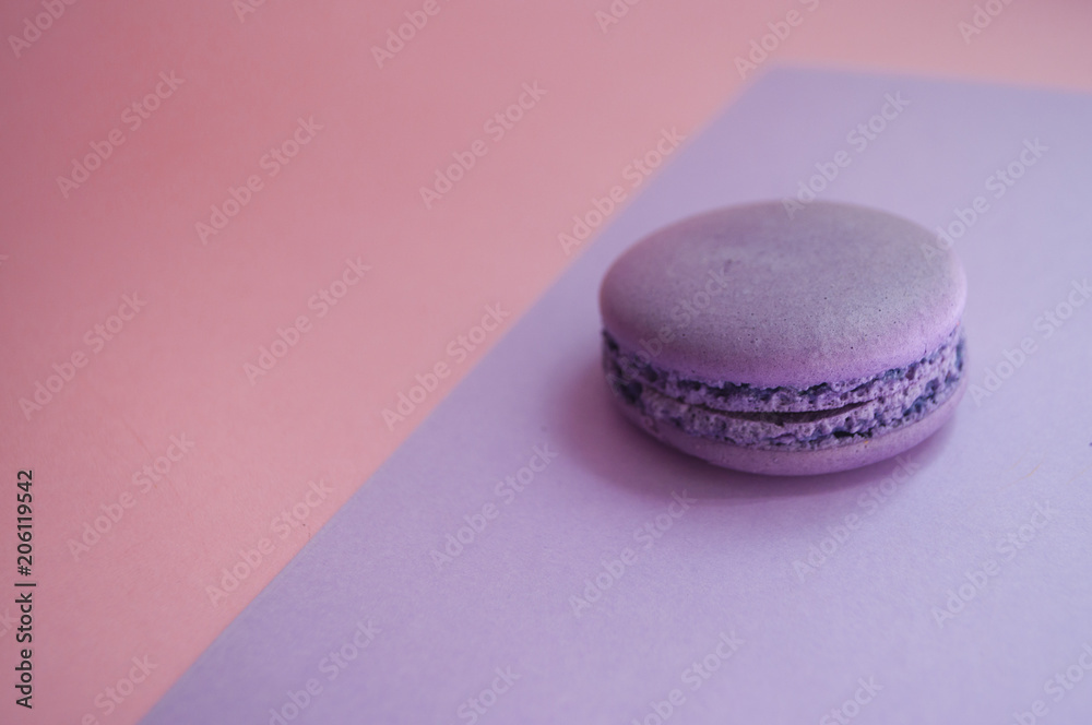 Single macaroon on colorful background. Single macaroon on colorful background.