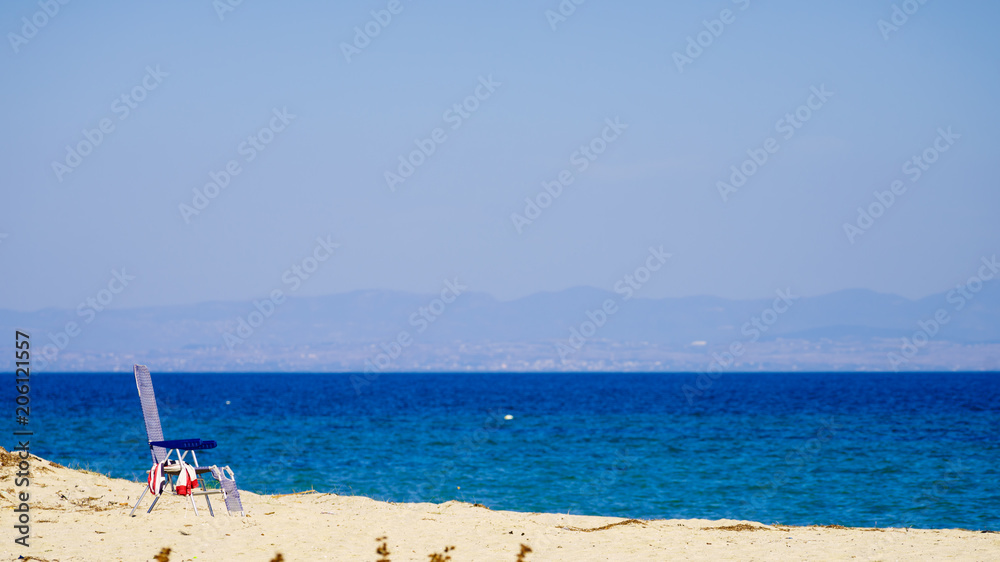 Obraz premium Deck chair on beach