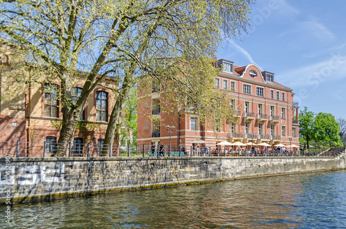 Bank of the river Spree Schiffbauerdamm with the building of Ida-Simon foundation