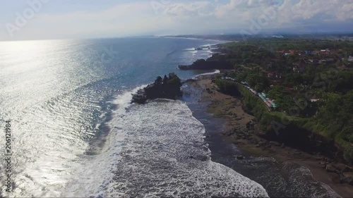 Aerial drone footage of Pura Tanahlot Temple on the Bali Island, Indonesia photo