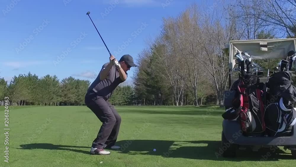 golfer hits the ball slider slow motion view golfer hits the ball slider slow motion view