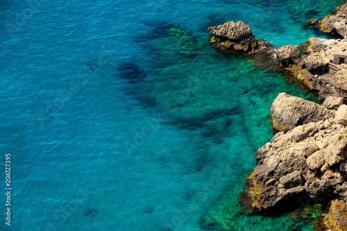 Crystal clear Water at the rocky Coast of Capri Island, Italy
