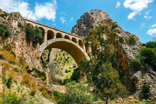stone railway bridge in the village of el chorro at the end of trail of Caminito Del Rey