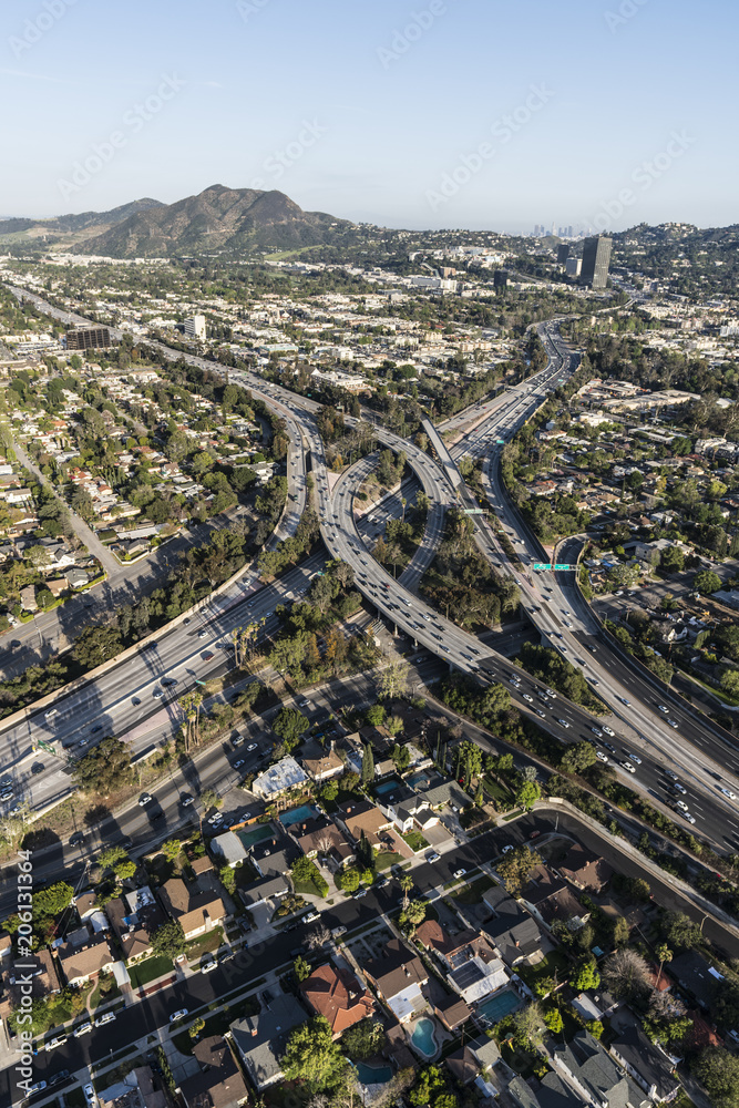 Vertical aerial view of Hollywood 170 and Ventura 101 freeways in the San Fernando Valley area of Los Angeles, California.