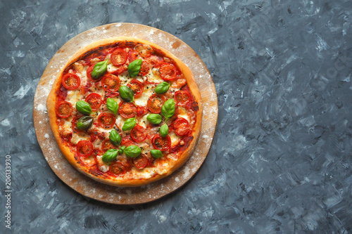Pizza margherita on the chalk board with copy space