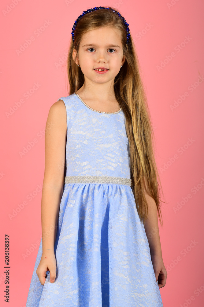 Little girl in fashionable dress, prom. Fashion model on pink background, beauty. Child girl in stylish glamour dress, elegance. Look, hairdresser, makeup. Fashion and beauty, little princess. Little girl in fashionable dress, prom. Fashion model on pink background, beauty. Child girl in stylish glamour dress, elegance. Look, hairdresser, makeup. Fashion and beauty, little princess.