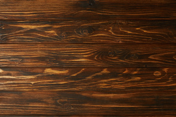 top view of brown wooden background with horizontal planks