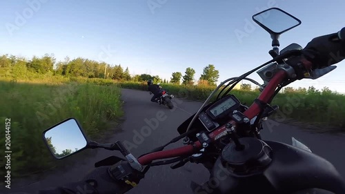 motorcycles hit corner after corner together racetrack chest gimbal gopro photo