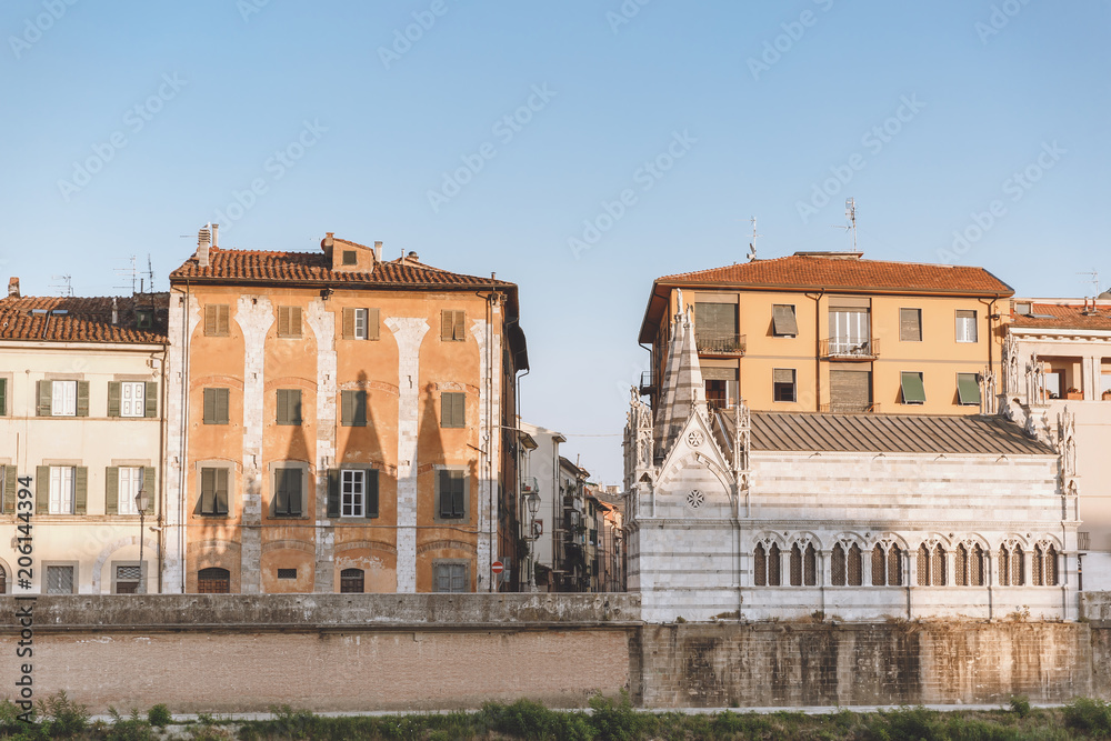 landmark with houses in old city, Pisa, Italy