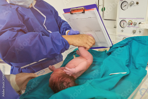 Registering newborn baby in clinic