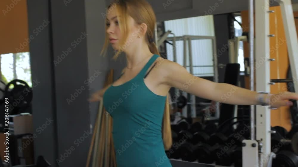Pretty girl, sports club, fitness training, daylight Pretty girl, sports club, fitness training, daylight