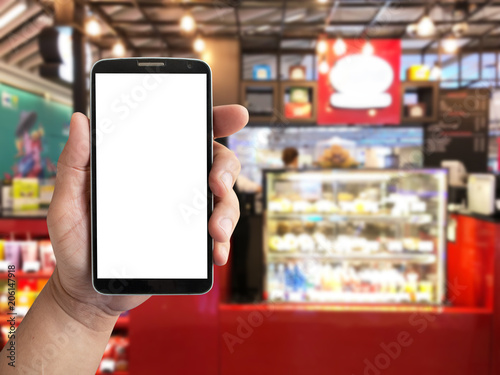 mockup display mobile phone in hand with blurred background