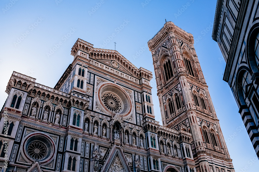 Fototapeta premium Beautiful facade of Duomo Cathedral with Giotto Bell Tower in Florence, Italy