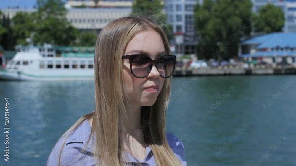 Young pretty girl chews a gum, outdoor Young pretty girl chews a gum, outdoor