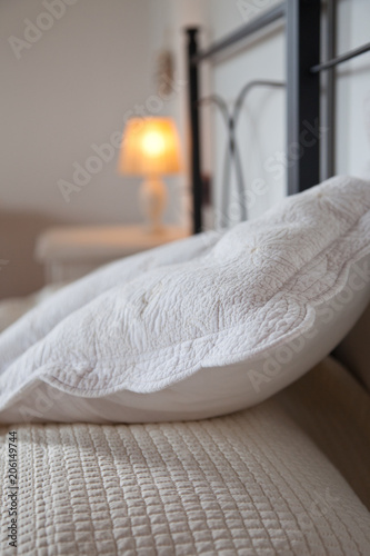 pillows on bed - bright bedroom interior design © Melinda Nagy