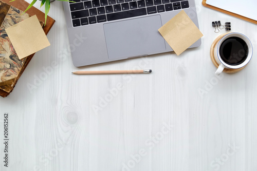 Office wooden desk laptop computer, office accessory and copy space.