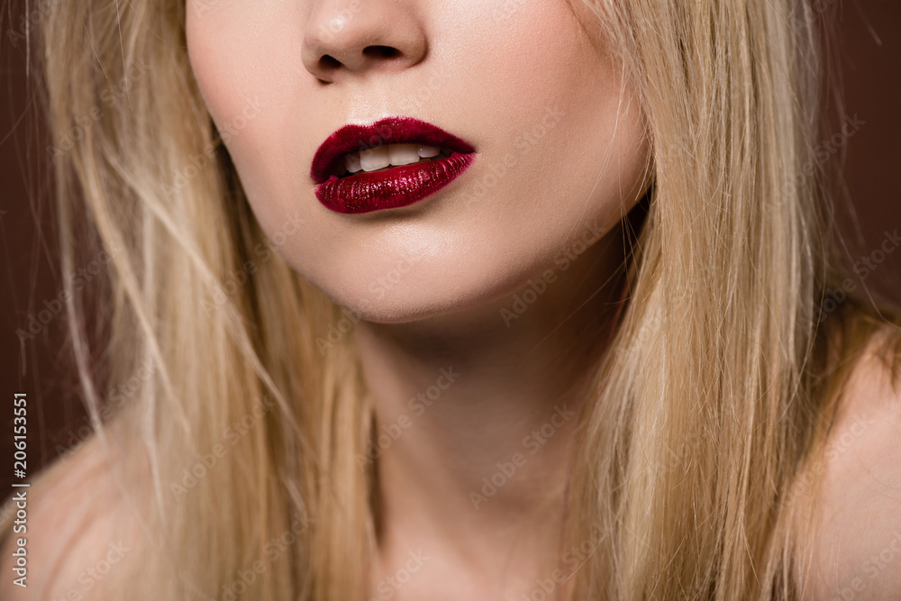 cropped shot of sensual young blonde woman with red lips cropped shot of sensual young blonde woman with red lips