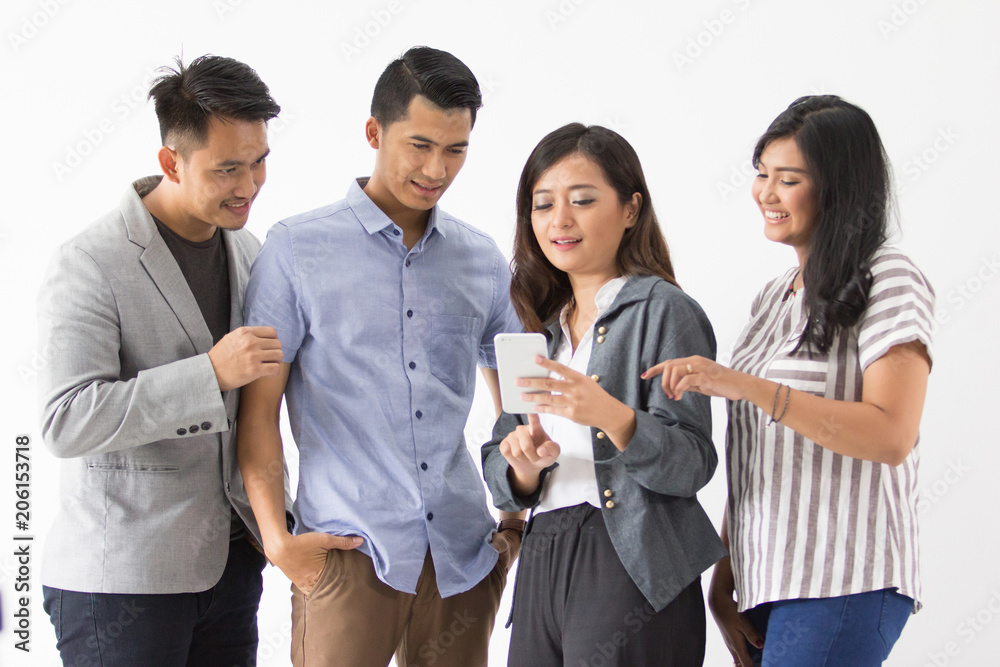 asian people looking something at smart phone asian people looking something at smart phone