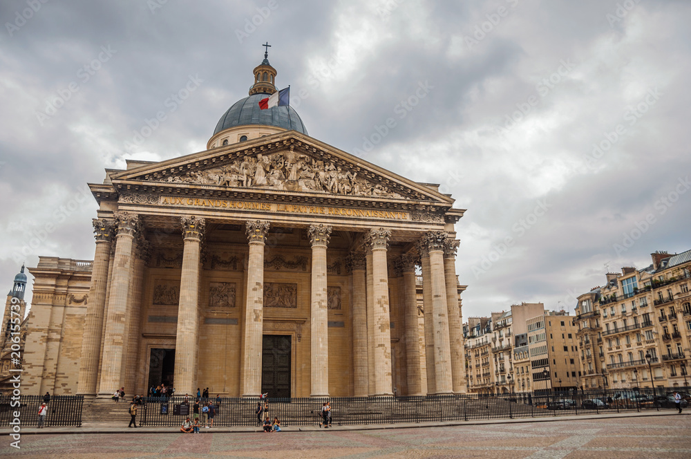 Obraz premium Facade of the Pantheon in Neoclassical style, with dome and columns at the entrance in Paris. Known as the “City of Light”, is one of the most impressive world’s cultural center. Northern France.