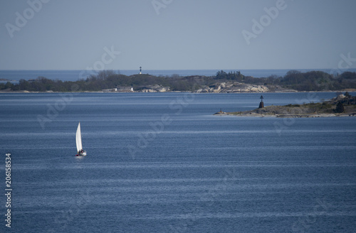 A sailingboat in the outer archipelago of Stockholm a tranquil day in spring