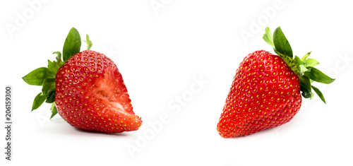 biting strawberry on white background