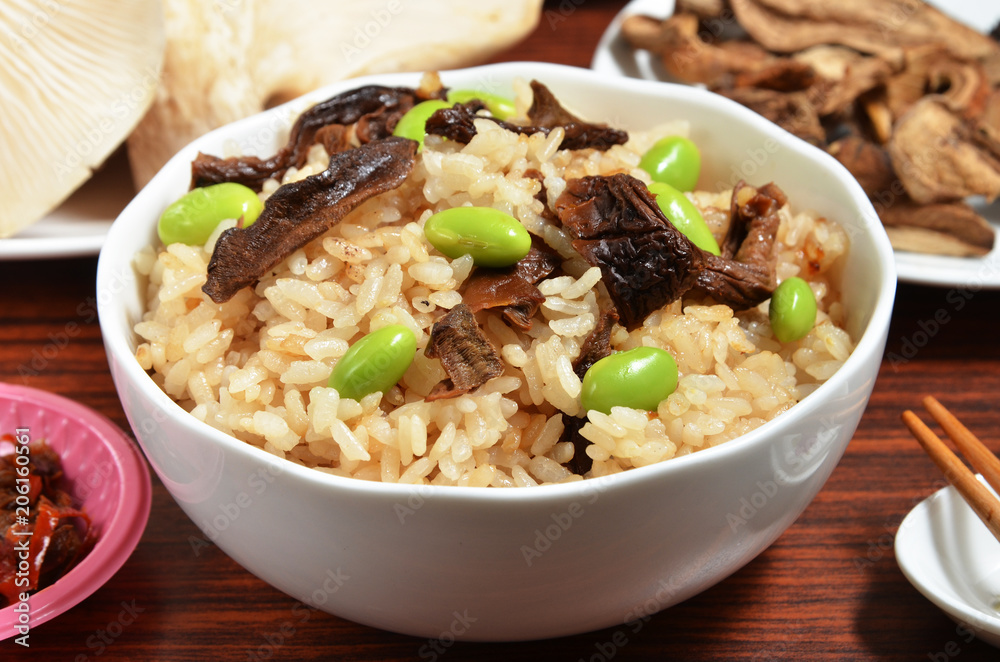 A bowl of porcino rice on the table