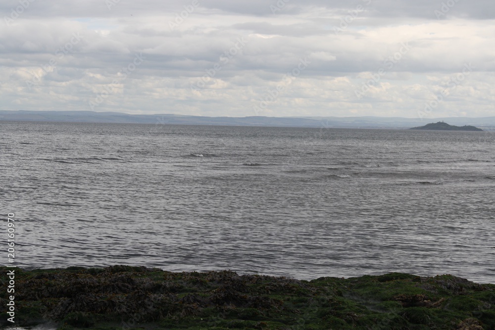 View of Scottish Isles from across the Sea View of Scottish Isles from across the Sea