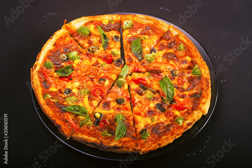 Close view of sliced Pizza on plate, food photography