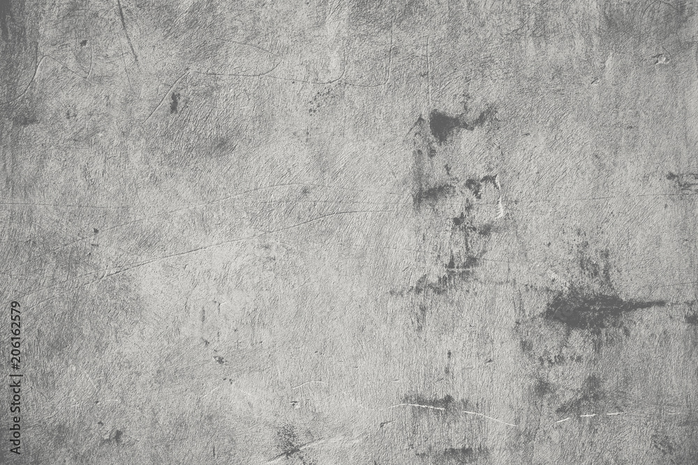 Concrete wall with dirty stains and scratches, textured background