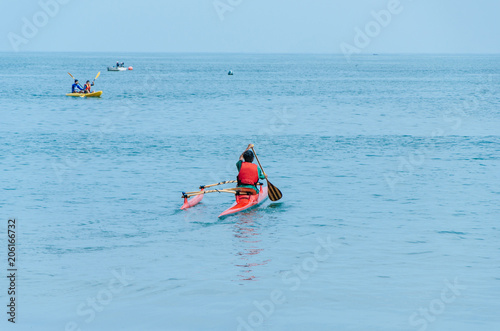 Kayaking. Man paddling a kayak.