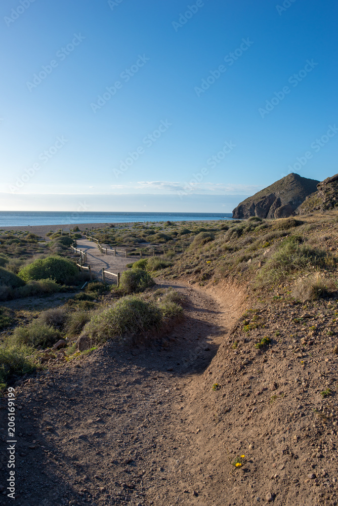 The beach of the dead with the sun and the blue sky