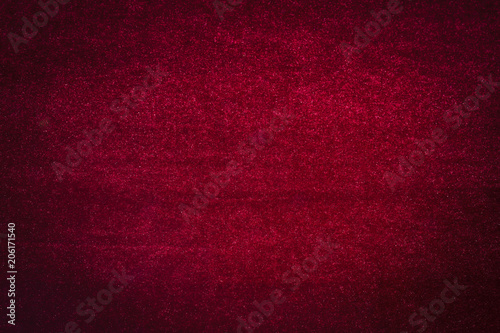 dark red velvet material, vignetting background image with space for text in the center photo