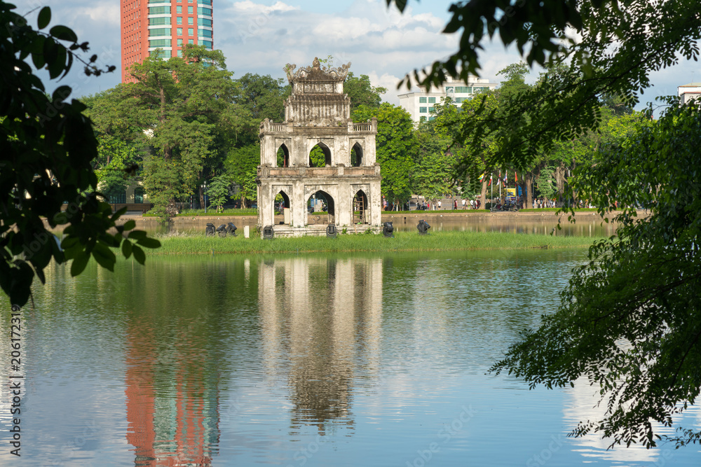Naklejka premium Turtle Tower (Thap Rua) in Hoan Kiem lake (Sword lake, Ho Guom) in Hanoi, Vietnam.
