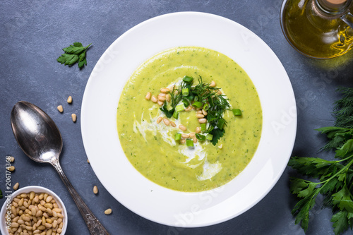Cream soup with zucchini, herbs and cream.