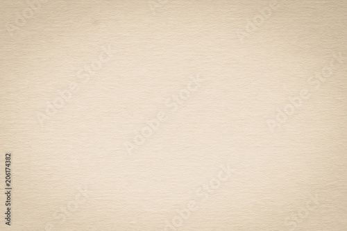 Bagasse cardboard or beermat recycle paperboard in beige brown sepia color texture background made of grainy fiber detail mulberry rice plant paper for beer mat paper board