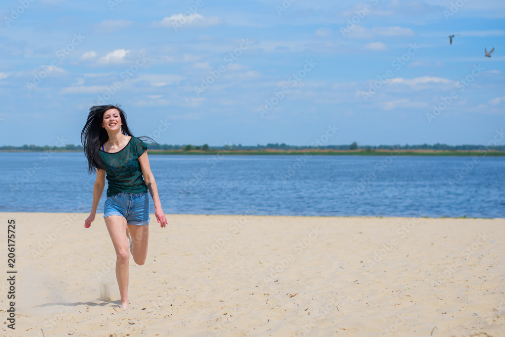 Woman Jumping on the Beach Having Fun, Summer vacation holiday Lifestyle. Happy women jumping freedom on white sand. 