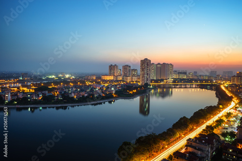 Aerial view of Hanoi skyline cityscape at twilight period. Linh Dam lake, south of Hanoi capital