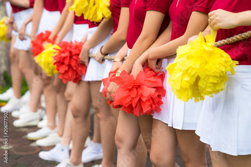 Asian young cheerleader group closeup with legs standing on row