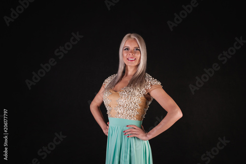 Portrait of elegant luxurious woman wearing dress