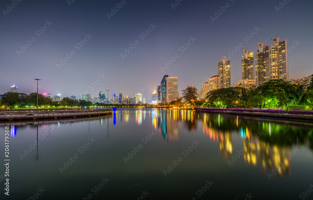 Lake Ratchada situated in the Benjakitti Park in Bangkok at nigh