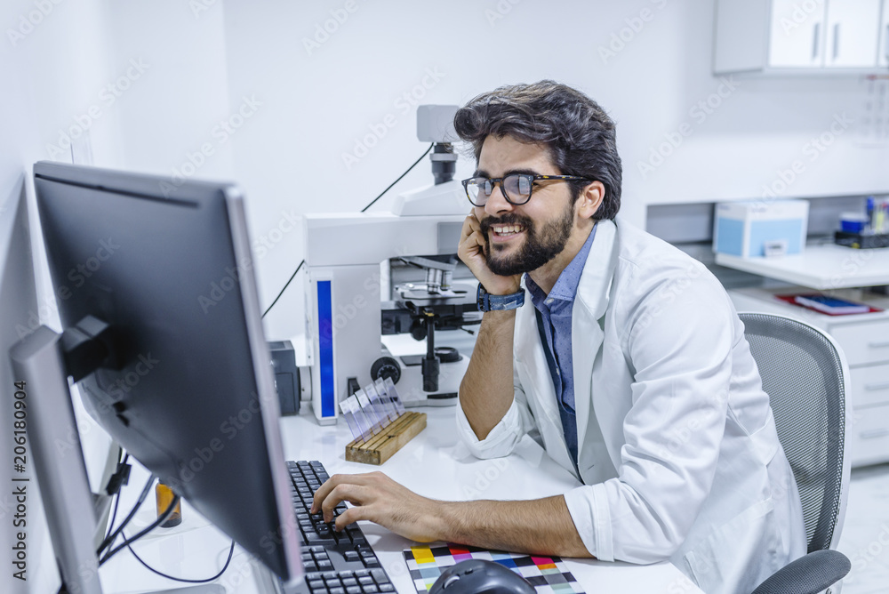 Male doctor at work in clinic office Male doctor at work in clinic office