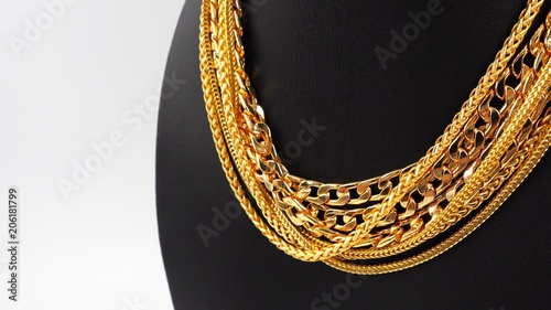 group of gold necklace isolated on white background
