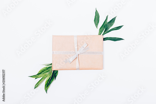 Top view of gift box wrapped in kraft paper