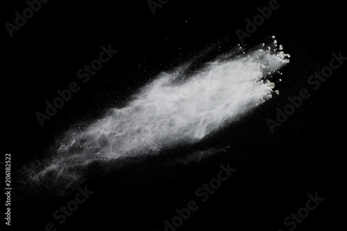 Explosion of powder isolated on black background