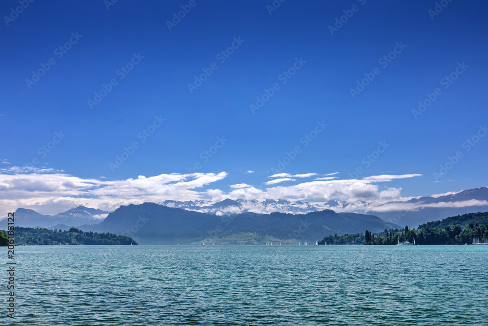 Mountain Lake in Lucerne on the background of of the Alpine Mountains. Beautiful landscape