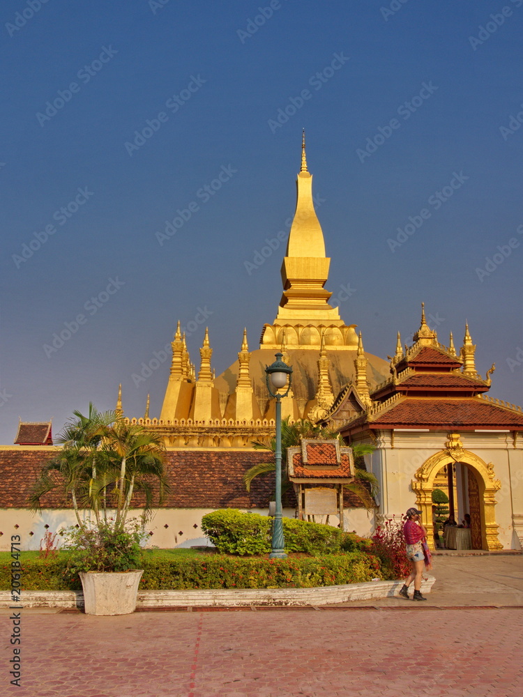 Fototapeta premium Pha That Luang is a gold-covered large Buddhist stupa in the centre of the city of Vientiane, Laos. Travel in 2013, 8th December.