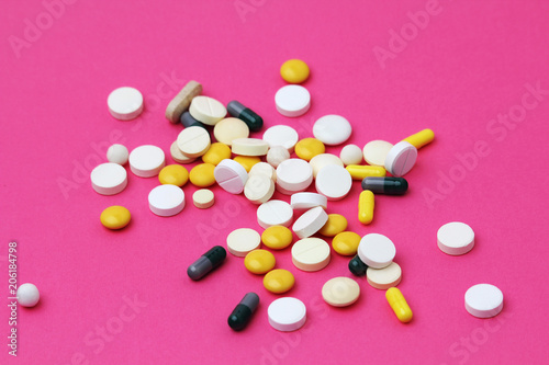 Medicines different forms and colors at bright background