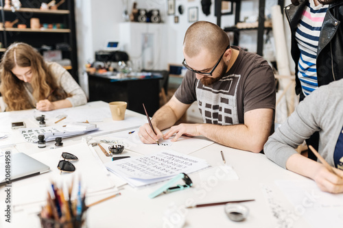 Lecture and training in calligraphy office for a group of people
