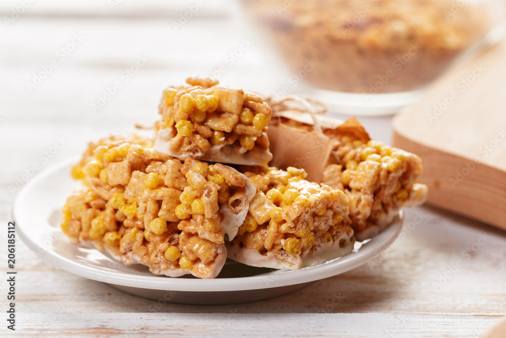 Granola bar on wooden background Granola bar on wooden background