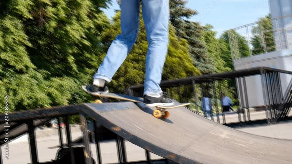 teen skateboarding in skate park teen skateboarding in skate park